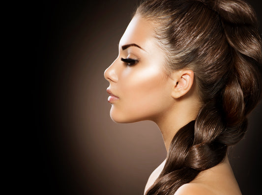Beautiful Woman With Braid Uses Black Castor Oil